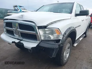2012 Ram 1500 Big Horn z VIN 1C6RD6GT0CS323124, wystawiony jako IAAI lot #41486027 z przebiegiem 107 784 mil mil oraz . Historia ofert i sprzedaży dostępna na DreamBid. Obrazek 6.