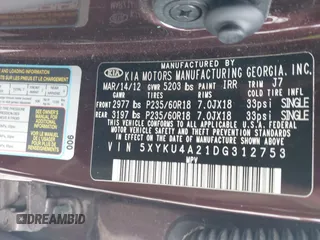 2013 Kia Sorento EX with VIN 5XYKU4A21DG312753, listed as a IAAI auction lot 41033124 with 197,459 mi miles and . Bid and sale history available at carsss.com. Image 9.