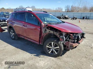 2018 Toyota RAV4 XLE with VIN 2T3RFREVXJW715931, listed as a Copart auction lot 48130715 with 106,324 mi miles and Salvage Title. Bid and sale history available at DreamBid. Image 4.
