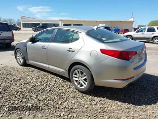 2013 Kia Optima LX with VIN 5XXGM4A78DG174862, listed as a IAAI auction lot 41823436 with 202,202 mi miles. Bid and sale history available at carsss.com. Image 3.