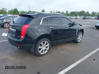 2015 Cadillac SRX Performance Collection with VIN 3GYFNCE3XFS638994, listed as a IAAI auction lot 42243558 with 141,704 mi miles and . Bid and sale history available at DreamBid. Image 4.