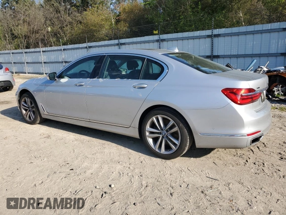 2016 BMW 7 Series 750i xDrive с VIN WBA7F2C58GG419163, выставлен на аукционе Copart как лот 52429835 с пробегом 93 025 миль миль и Списание • Salvage title. История ставок и продаж доступна на DreamBid. Изображение 2.