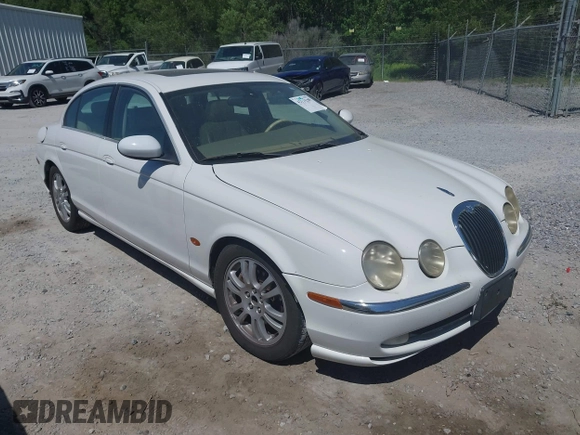 2003 Jaguar S-Type with VIN SAJEA01U93HM89560, listed as a IAAI auction lot 42115289 with 236,905 mi miles and . Bid and sale history available at DreamBid. Image 1.