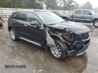 2019 Cadillac XT4 FWD Premium Luxury with VIN 1GYFZCR47KF152164, listed as a Copart auction lot 44705115 with 99,115 mi miles and Salvage Title. Bid and sale history available at carsss.com. Image 4.