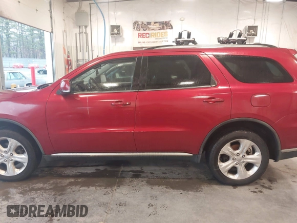 2014 Dodge Durango Limited z VIN 1C4RDJDG2EC370977, wystawiony jako IAAI lot #41872587 z przebiegiem 153 674 mil mil oraz . Historia ofert i sprzedaży dostępna na DreamBid. Obrazek 14.