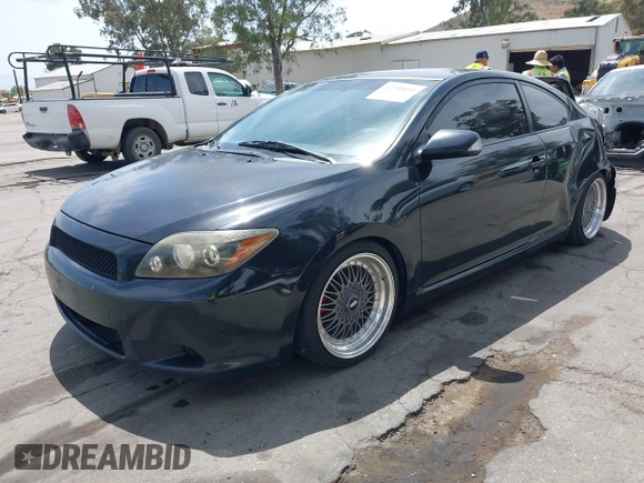 2008 Scion tC Spec with VIN JTKDE167X80256518, listed as a IAAI auction lot 42238691 with 245,294 mi miles and . Bid and sale history available at DreamBid. Image 2.