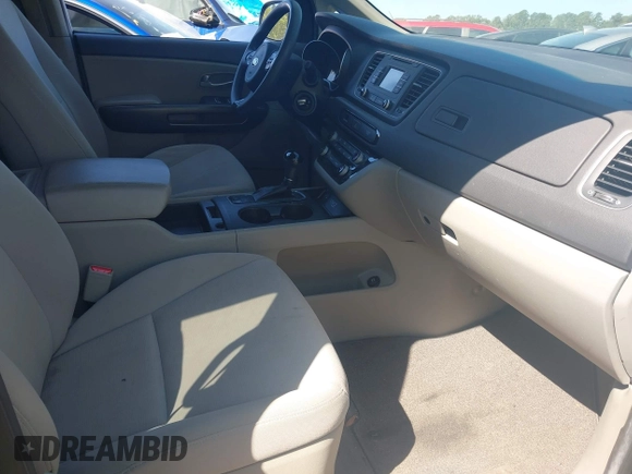 2015 Kia Sedona LX with VIN KNDMB5C14F6036762, listed as a IAAI auction lot 42002812 with 140,518 mi miles. Bid and sale history available at carsss.com. Image 5.