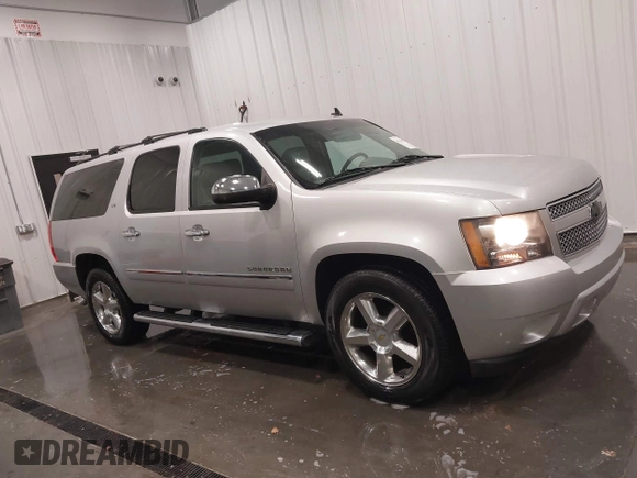 2011 Chevrolet Suburban LTZ with VIN 1GNSKKE31BR143238, listed as a IAAI auction lot 41621927 with 224,313 mi miles and . Bid and sale history available at DreamBid. Image 14.