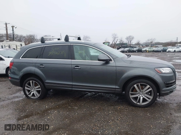 2015 Audi Q7 3.0T Premium Plus with VIN WA1LGAFE7FD013891, listed as a IAAI auction lot 41819325 with 999,999 mi miles. Bid and sale history available at carsss.com. Image 12.