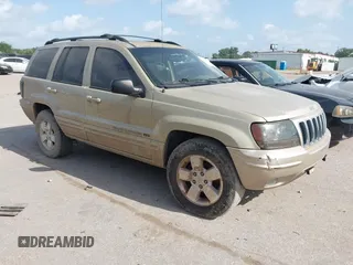 2001 Jeep Grand Cherokee Limited with VIN 1J4GW58N51C575036, listed as a IAAI auction lot 42573849 with 223,757 mi miles and . Bid and sale history available at DreamBid. Image 1.