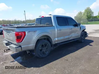 2022 Ford F-150 XL z VIN 1FTEW1EP9NFA65479, wystawiony jako IAAI lot #42165173 z przebiegiem 36 579 mil mil oraz . Historia ofert i sprzedaży dostępna na DreamBid. Obrazek 4.