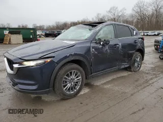 2017 Mazda CX-5 Touring z VIN JM3KFBCL2H0215200, wystawiony jako Copart lot #51491925 z przebiegiem 66 455 mil mil oraz Szkody całkowita. Historia ofert i sprzedaży dostępna na DreamBid. Obrazek 1.