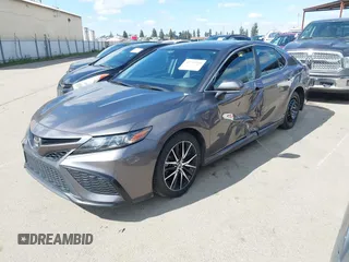 2022 Toyota Camry SE with VIN 4T1G11AK1NU499064, listed as a IAAI auction lot 41734310 with 87,159 mi miles and . Bid and sale history available at DreamBid. Image 2.