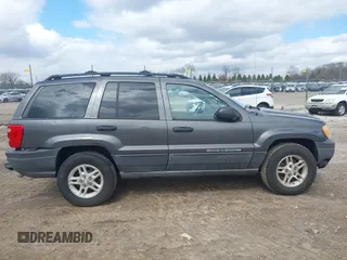 2004 Jeep Grand Cherokee Laredo z VIN 1J4GW48SX4C213322, wystawiony jako IAAI lot #41969362 z przebiegiem 273 876 mil mil oraz . Historia ofert i sprzedaży dostępna na DreamBid. Obrazek 13.
