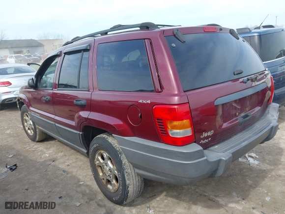 2001 Jeep Grand Cherokee Laredo with VIN 1J4GW48S51C739725, listed as a IAAI auction lot 41800431 with 220,396 mi miles. Bid and sale history available at carsss.com. Image 3.