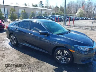 2017 Honda Civic Sedan EX-L with VIN 19XFC1F71HE029540, listed as a IAAI auction lot 41878037 with 82,064 mi miles. Bid and sale history available at carsss.com. Image 1.