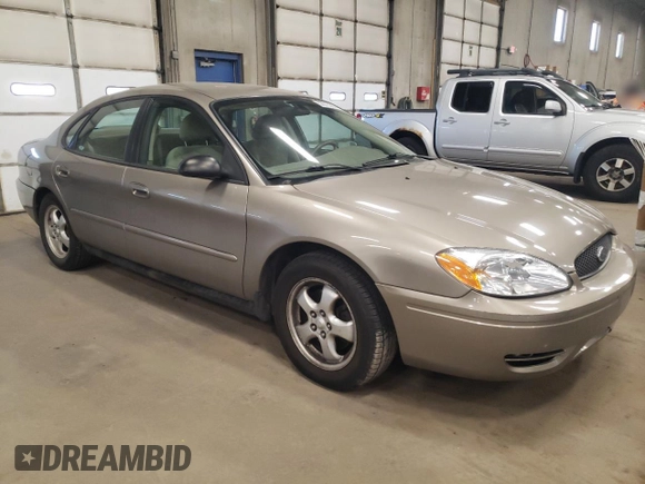 2005 Ford Taurus SE with VIN 1FAFP53U15A276082, listed as a Copart auction lot 52015285 with 103,479 mi miles and Salvage Title. Bid and sale history available at carsss.com. Image 4.