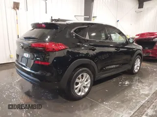 2019 Hyundai Tucson Value z VIN KM8J3CA48KU075082, wystawiony jako IAAI lot #42105673 z przebiegiem 43 052 mil mil oraz . Historia ofert i sprzedaży dostępna na DreamBid. Obrazek 4.