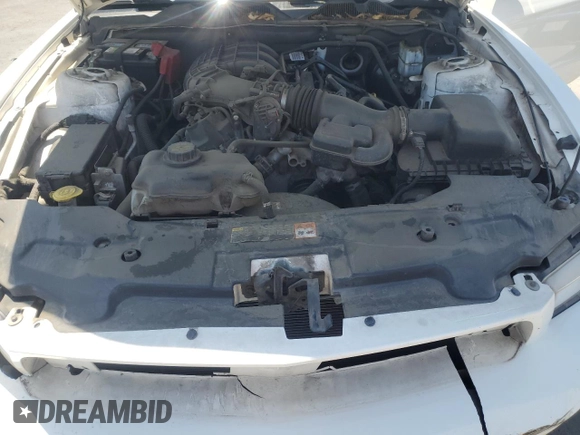 2012 Ford Mustang Premium with VIN 1ZVBP8AM0C5283038, listed as a Copart auction lot 58961615 with 140,727 mi miles and Salvage title. Bid and sale history available at DreamBid. Image 11.