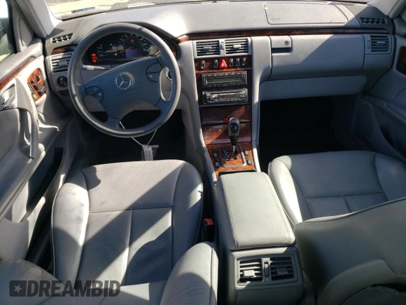 2001 Mercedes-Benz E-Class with VIN WDBJF65J01B325792, listed as a Copart auction lot 76328704 with 101,886 mi miles and Salvage Title. Bid and sale history available at carsss.com. Image 8.