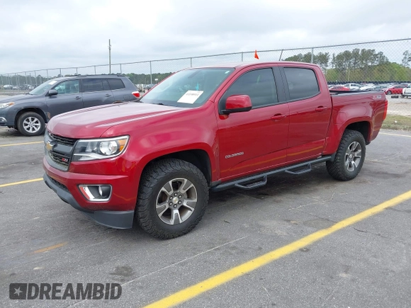 2020 Chevrolet Colorado 4WD Z71 with VIN 1GCGTDEN3L1132444, listed as a IAAI auction lot 41898911 with 65,493 mi miles and . Bid and sale history available at DreamBid. Image 2.