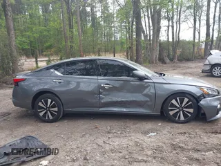 2019 Nissan Altima SL z VIN 1N4BL4EV4KC256015, wystawiony jako IAAI lot #42041439 z przebiegiem 104 888 mil mil oraz . Historia ofert i sprzedaży dostępna na DreamBid. Obrazek 13.