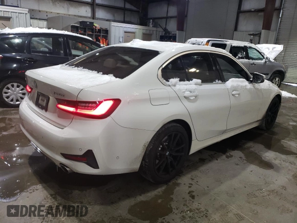 2019 BMW 3 Series 330i xDrive with VIN WBA5R7C59KAJ81850, listed as a Copart auction lot 88526315 with 64,770 mi miles and Salvage title. Bid and sale history available at DreamBid. Image 3.