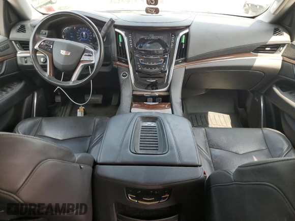 2020 Cadillac Escalade Luxury z VIN 1GYS4BKJ6LR285845, wystawiony jako Copart lot #68504204 z przebiegiem 60 677 mil mil oraz Szkoda całkowita • Salvage title. Historia ofert i sprzedaży dostępna na DreamBid. Obrazek 8.