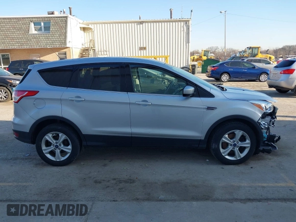 2016 Ford Escape SE with VIN 1FMCU9GX0GUA13421, listed as a IAAI auction lot 41788760 with 123,062 mi miles and . Bid and sale history available at DreamBid. Image 14.