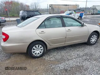 2004 Toyota Camry LE with VIN 4T1BE32K94U347539, listed as a IAAI auction lot 41957246 with 234,747 mi miles and . Bid and sale history available at carsss.com. Image 4.