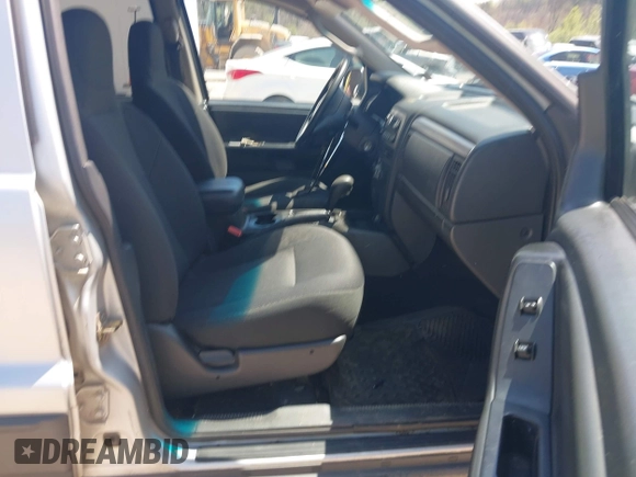 2004 Jeep Grand Cherokee Laredo with VIN 1J4GW48S14C377204, listed as a IAAI auction lot 42087966 with 78,110 mi miles. Bid and sale history available at carsss.com. Image 5.