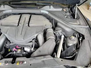 2022 Genesis GV80 with VIN KMUHCESC4NU092659, listed as a Copart auction lot 63460895 with 28,779 mi miles and Salvage title. Bid and sale history available at DreamBid. Image 16.