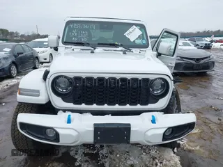 2024 Jeep Wrangler High Altitude z VIN 1C4RJXU66RW174919, wystawiony jako IAAI lot #41563619 z przebiegiem 4 133 mil mil oraz . Historia ofert i sprzedaży dostępna na DreamBid. Obrazek 12.