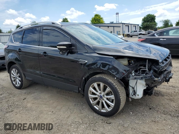 2017 Ford Escape Titanium with VIN 1FMCU9J9XHUD30408, listed as a Copart auction lot 58393844 with 81,779 mi miles and Salvage Title. Bid and sale history available at carsss.com. Image 4.