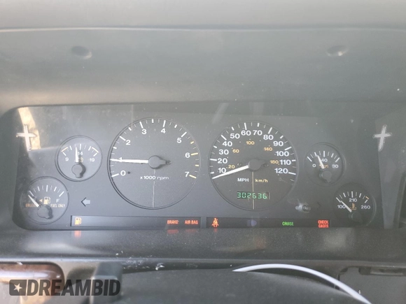 1996 Jeep Grand Cherokee Laredo with VIN 1J4FX58SXTC349575, listed as a Copart auction lot 80545584 with 302,636 mi miles and Salvage Title. Bid and sale history available at carsss.com. Image 9.