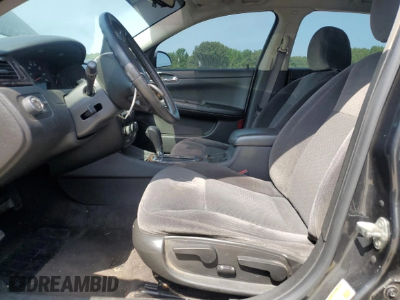 2014 Chevrolet Impala LS with VIN 2G1WA5E31E1171237, listed as a Copart auction lot 61774405 with 141,838 mi miles and Salvage title. Bid and sale history available at DreamBid. Image 7.