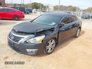 2014 Nissan Altima SL with VIN 1N4BL3AP7EC408083, listed as a IAAI auction lot 40978013 with 108,381 mi miles and . Bid and sale history available at DreamBid. Image 2.