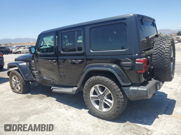 2020 Jeep Wrangler Unlimited Sahara with VIN 1C4HJXEN9LW247869, listed as a Copart auction lot 62697245 with 100,982 mi miles and Salvage title. Bid and sale history available at DreamBid. Image 2.