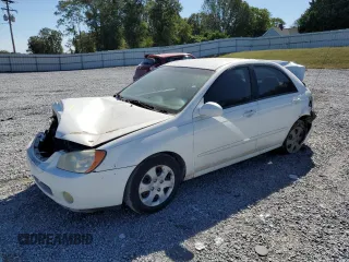 2005 Kia Spectra LX with VIN KNAFE121055167652, listed as a Copart auction lot 72753994 with Not Provided miles and Salvage Title. Bid and sale history available at carsss.com. Image 1.