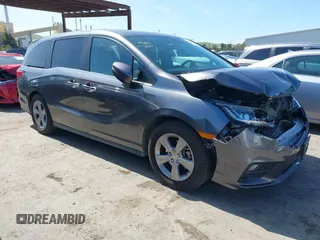 2018 Honda Odyssey EX-L z VIN 5FNRL6H75JB024493, wystawiony jako IAAI lot #41845611 z przebiegiem 149 401 mil mil oraz . Historia ofert i sprzedaży dostępna na DreamBid. Obrazek 1.