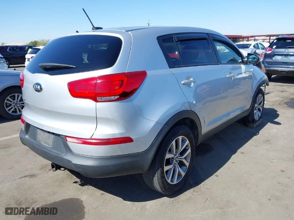 2015 Kia Sportage LX with VIN KNDPBCAC3F7678745, listed as a IAAI auction lot 41664074 with 124,526 mi miles. Bid and sale history available at carsss.com. Image 4.