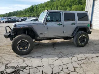 2014 Jeep Wrangler Unlimited Polar with VIN 1C4BJWEG7EL170487, listed as a Copart auction lot 55999005 with 103,735 mi miles and Salvage title. Bid and sale history available at DreamBid. Image 1.