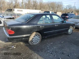 1996 Mercedes-Benz E-Class with VIN WDBJF55F9TJ006471, listed as a Copart auction lot 84835264 with 0 mi miles and Salvage Title. Bid and sale history available at carsss.com. Image 3.
