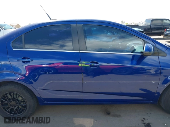 2013 Chevrolet Sonic LT with VIN 1G1JC5SG0D4168831, listed as a IAAI auction lot 42124531 with 149,096 mi miles and . Bid and sale history available at DreamBid. Image 13.