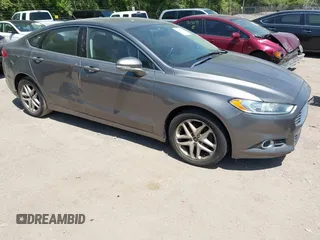 2014 Ford Fusion SE with VIN 3FA6P0HD7ER328428, listed as a IAAI auction lot 42242714 with 74,199 mi miles and . Bid and sale history available at DreamBid. Image 1.