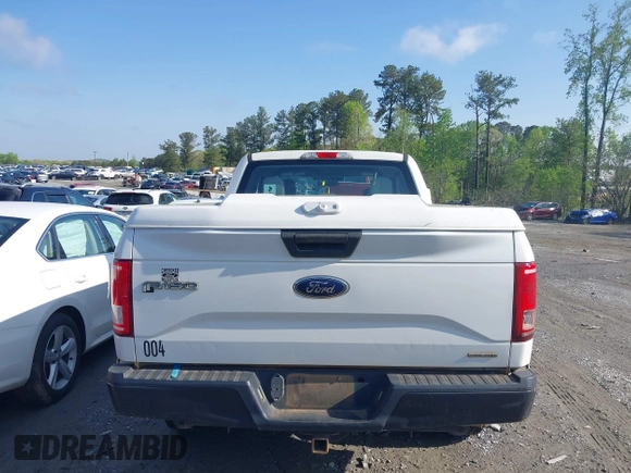 2016 Ford F-150 XLT with VIN 1FTEX1E89GFA95834, listed as a IAAI auction lot 41986995 with 153,202 mi miles. Bid and sale history available at carsss.com. Image 16.