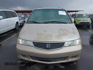 1999 Honda Odyssey EX z VIN 2HKRL1867XH535563, wystawiony jako IAAI lot #42188335 z przebiegiem 198 322 mil mil oraz . Historia ofert i sprzedaży dostępna na DreamBid. Obrazek 6.