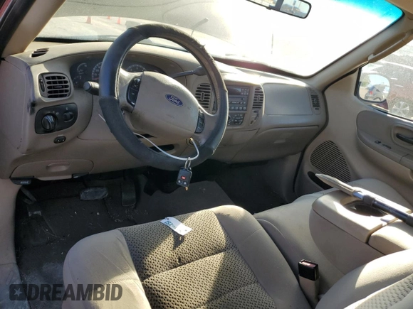 2003 Ford F-150 XL with VIN 1FTRF17L63NA32146, listed as a Copart auction lot 75204414 with 1,745,073 mi miles and Salvage Title. Bid and sale history available at DreamBid. Image 8.