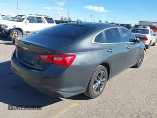 2018 Chevrolet Malibu LT z VIN 1G1ZD5STXJF239806, wystawiony jako IAAI lot #42175966 z przebiegiem 160 282 mil mil oraz . Historia ofert i sprzedaży dostępna na DreamBid. Obrazek 4.