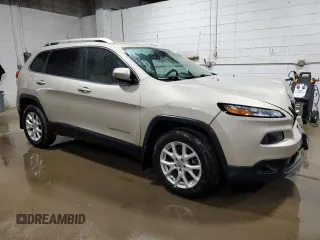 2015 Jeep Cherokee Latitude with VIN 1C4PJMCS1FW601438, listed as a Copart auction lot 48332875 with 135,380 mi miles and Salvage Title. Bid and sale history available at DreamBid. Image 4.